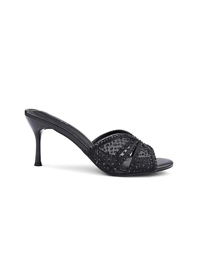 أيقون صنادل بكعب عالي مزينة بأشرطة